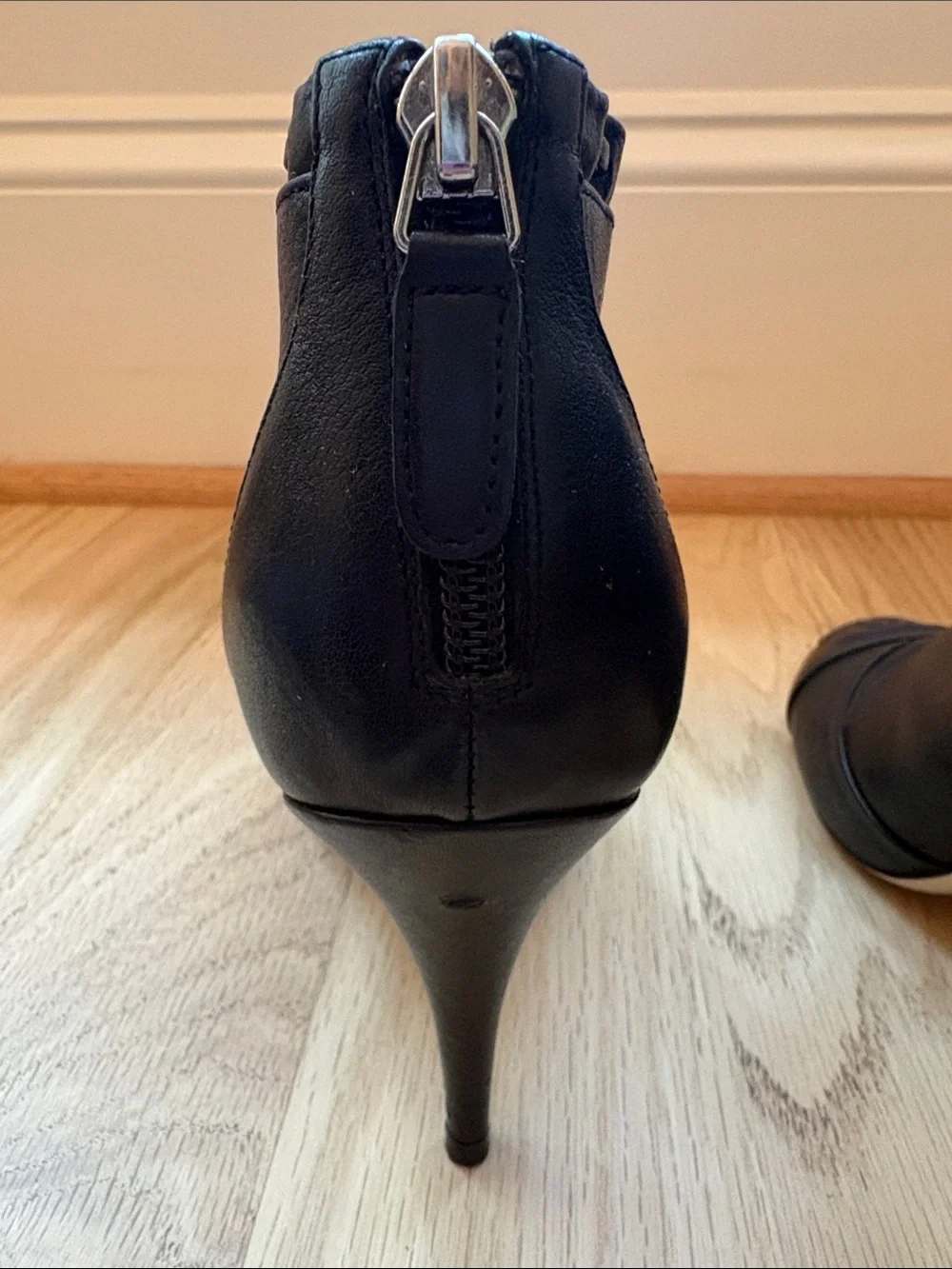 CHANEL Black Leather Ankle Booties with Bow-Trim and CC Toe